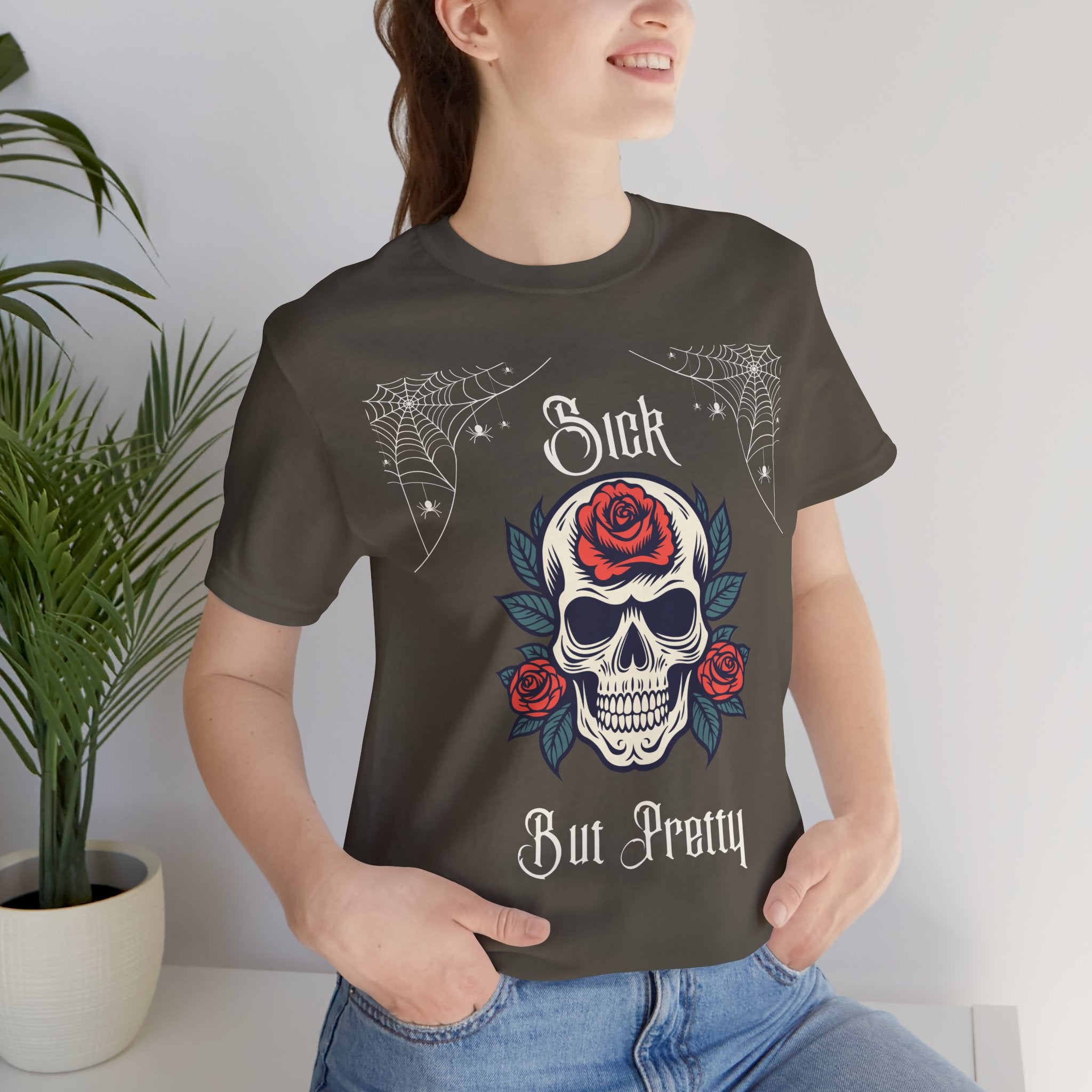 Black Skull and Spiderweb T-Shirt by Printify featuring a gothic skull design on soft cotton fabric.