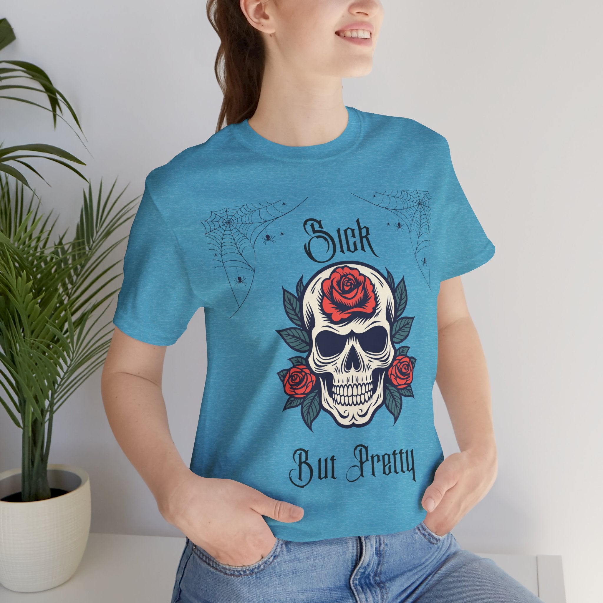 Black Skull and Spiderweb T-Shirt by Printify featuring a gothic design on soft cotton fabric.