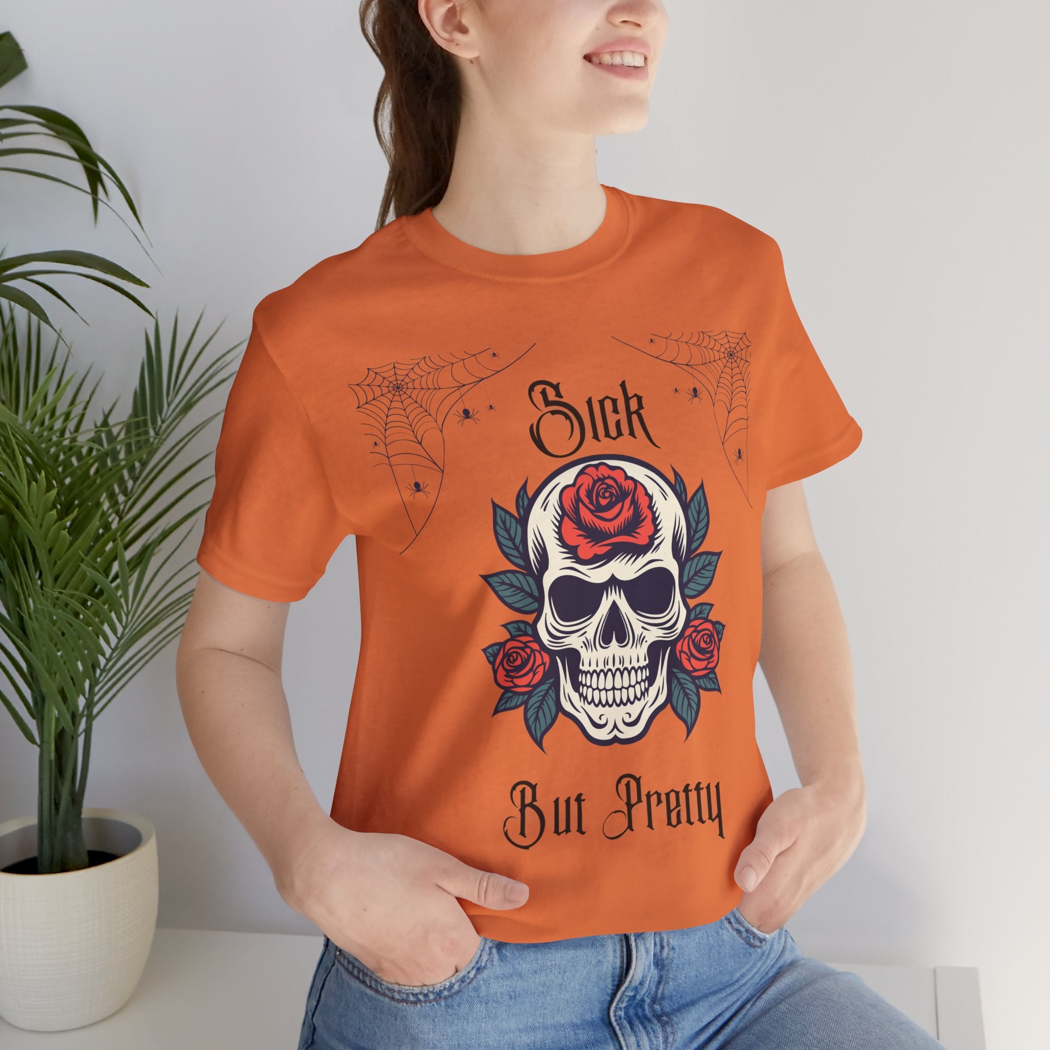 Black Skull and Spiderweb graphic T-shirt by Printify featuring a spooky, stylish design on soft cotton fabric.