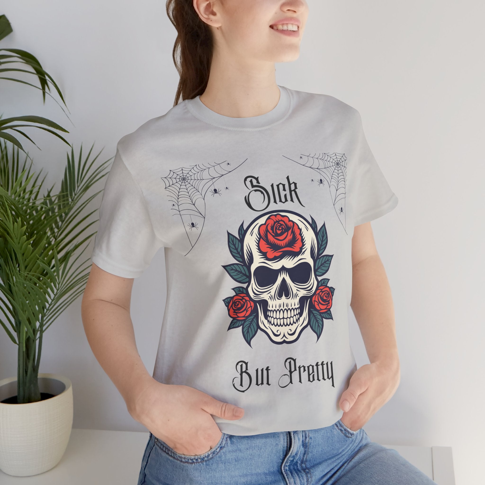 Black Skull and Spiderweb T-Shirt with "Sick but Pretty" print, featuring gothic design on soft cotton fabric.