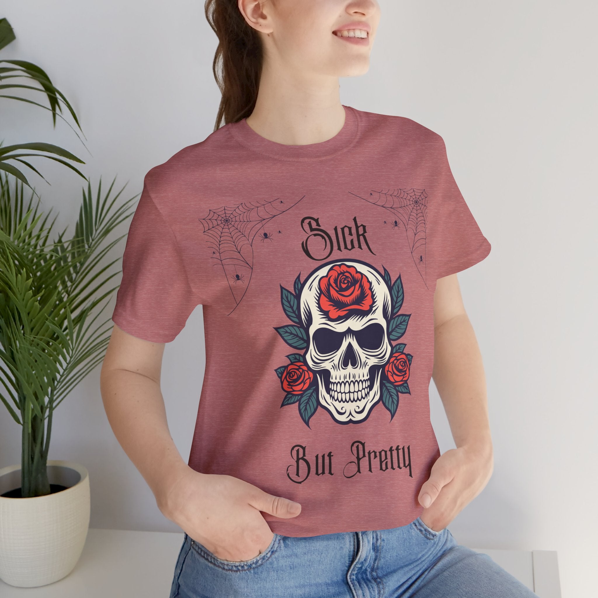 Black Skull & Spiderweb T-Shirt by Printify featuring a spooky design on the front, casual fit, and comfortable fabric.