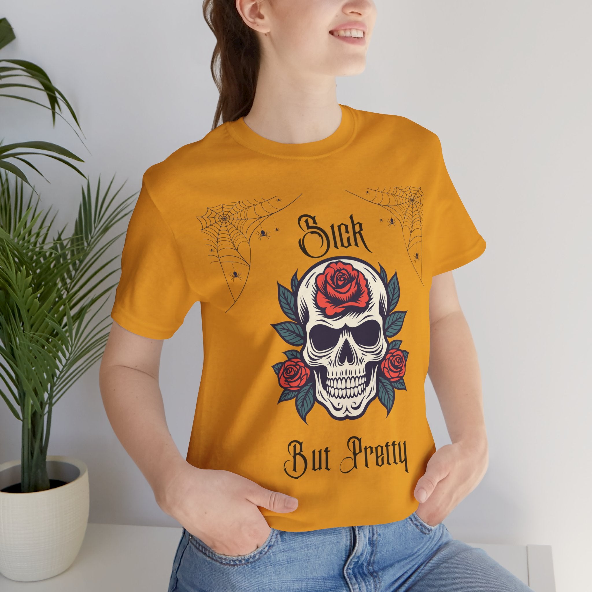 Black Skull and Spiderweb T-Shirt from Printify featuring a gothic design and the phrase "Sick but Pretty" on the front.