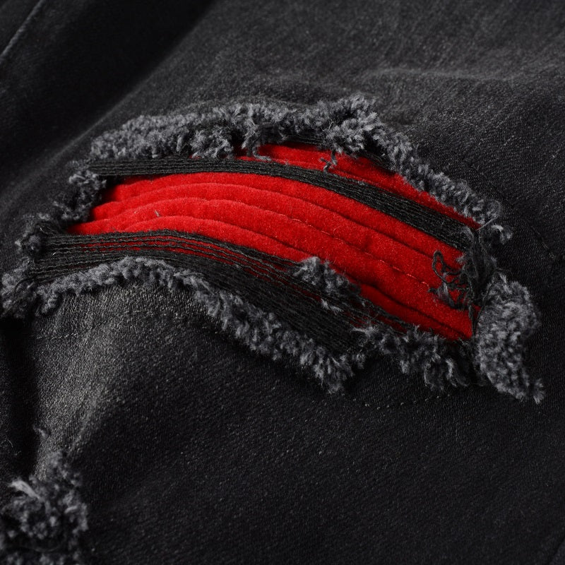 Blackthorn 31 stretch slim black jeans for men, close-up view showing fitted design and denim texture.