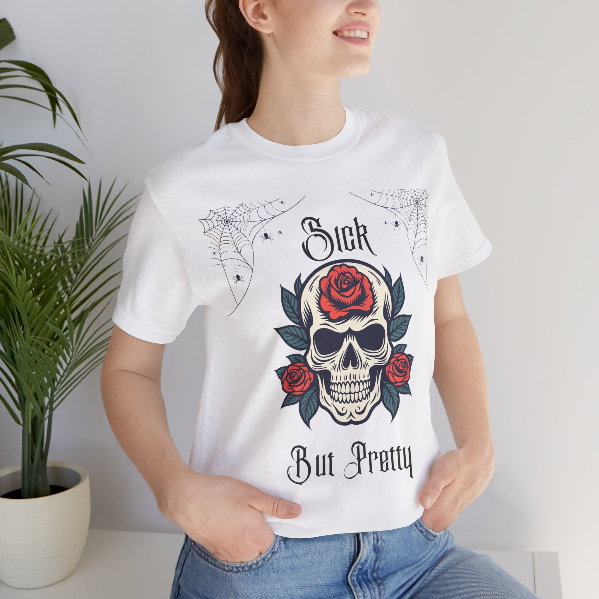Black Skull and Spiderweb T-Shirt by Printify featuring a gothic design and "Sick but Pretty" text on the front.