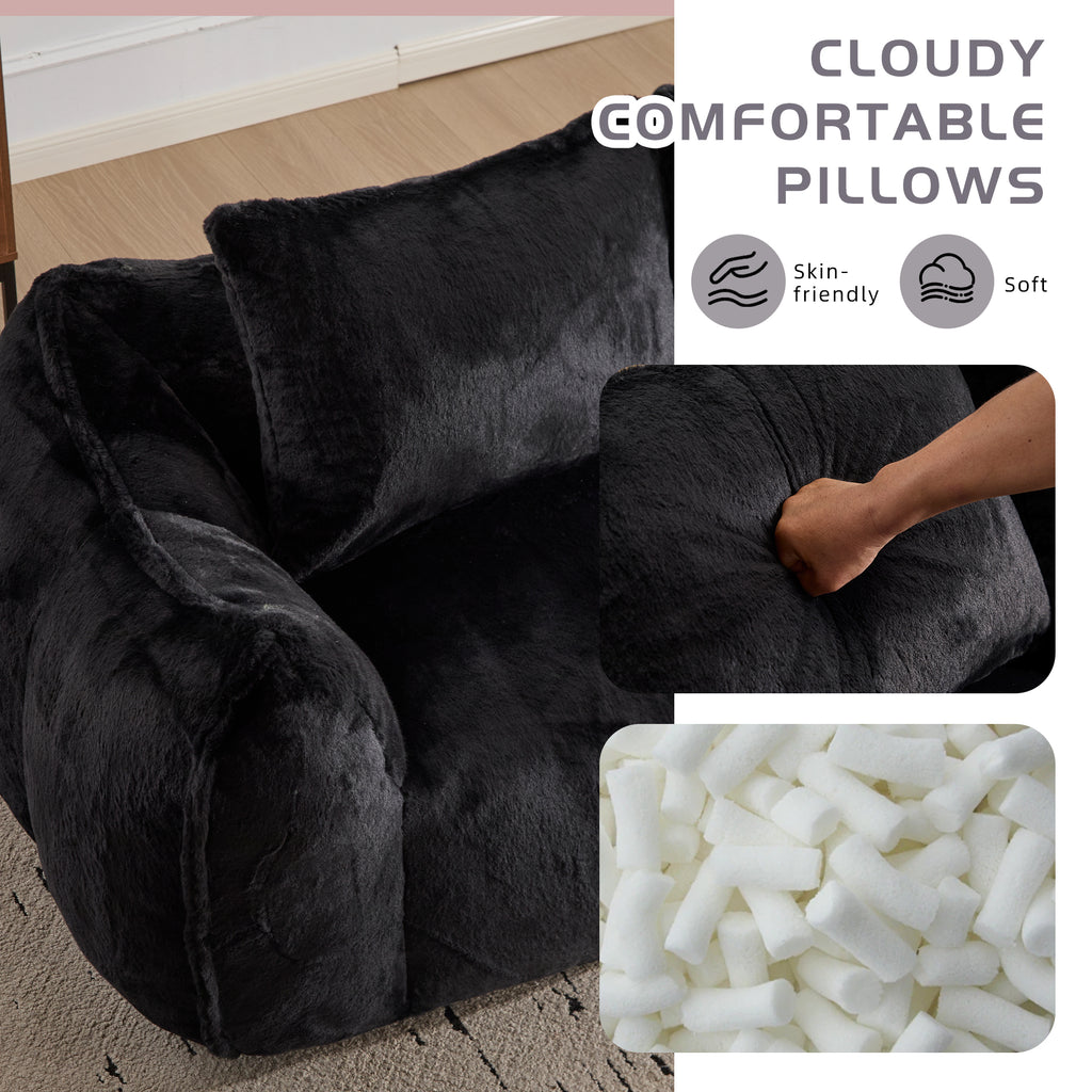 Blackthorn 31 oversized black bean bag couch for adults, soft plush lounge chair with pillows, ideal for living room or bedroom relaxation.