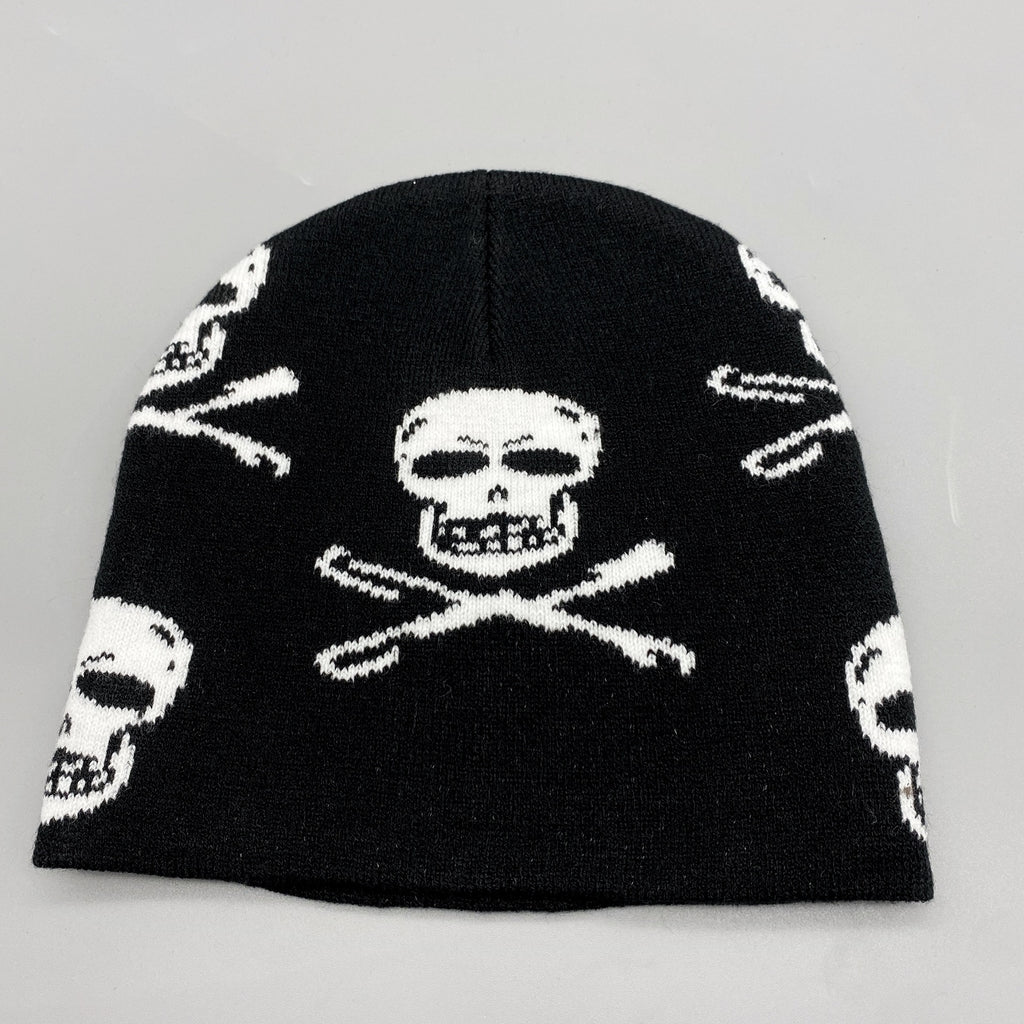 Men's black skull knitted hat by Blackthorn 31, featuring a stylish skull design and cozy knit texture.