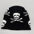 Men's black skull knitted hat by Blackthorn 31, featuring a stylish skull design and cozy knit texture.