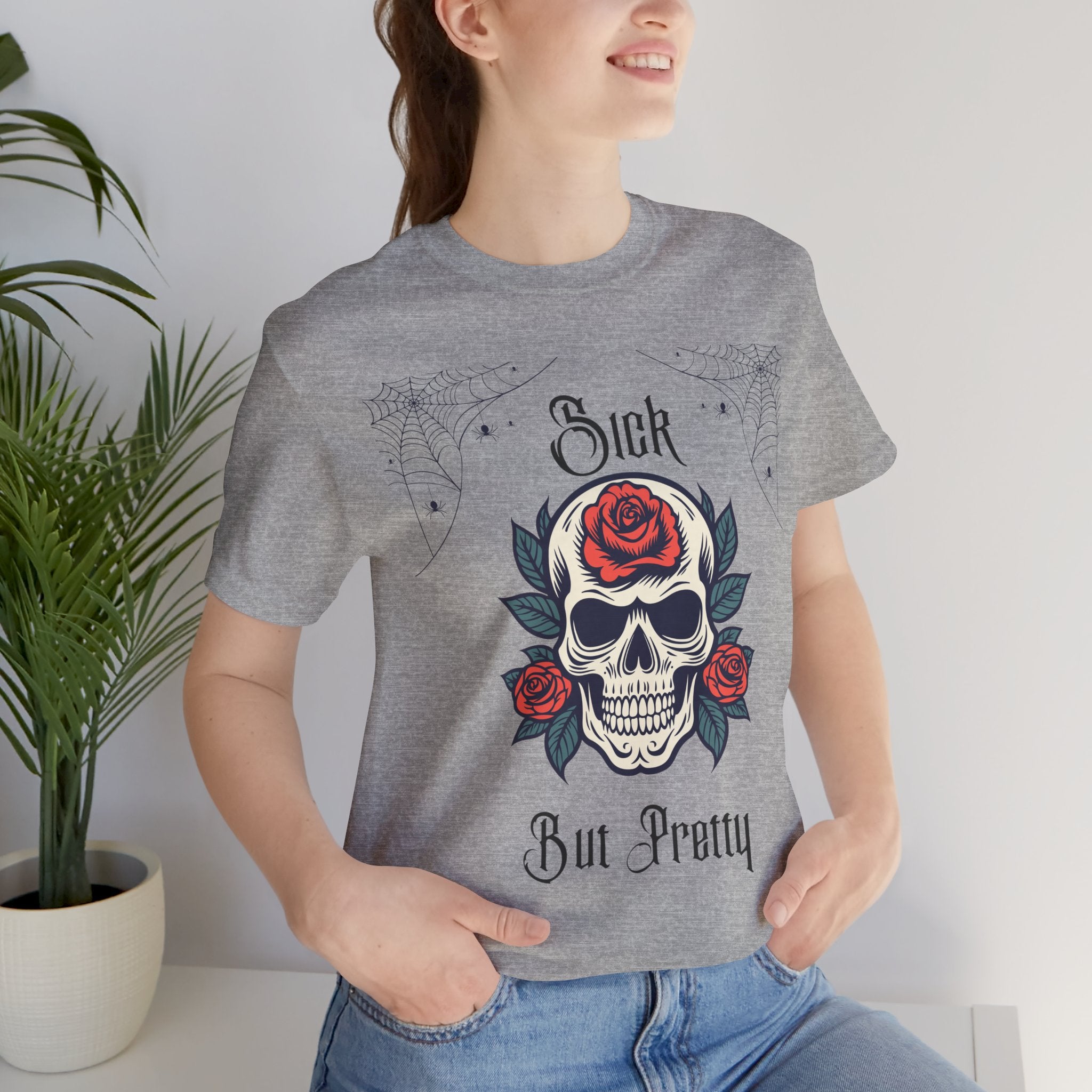 Black Skull and Spiderweb T-Shirt by Printify featuring spooky skull graphic and intricate web design on soft cotton fabric.