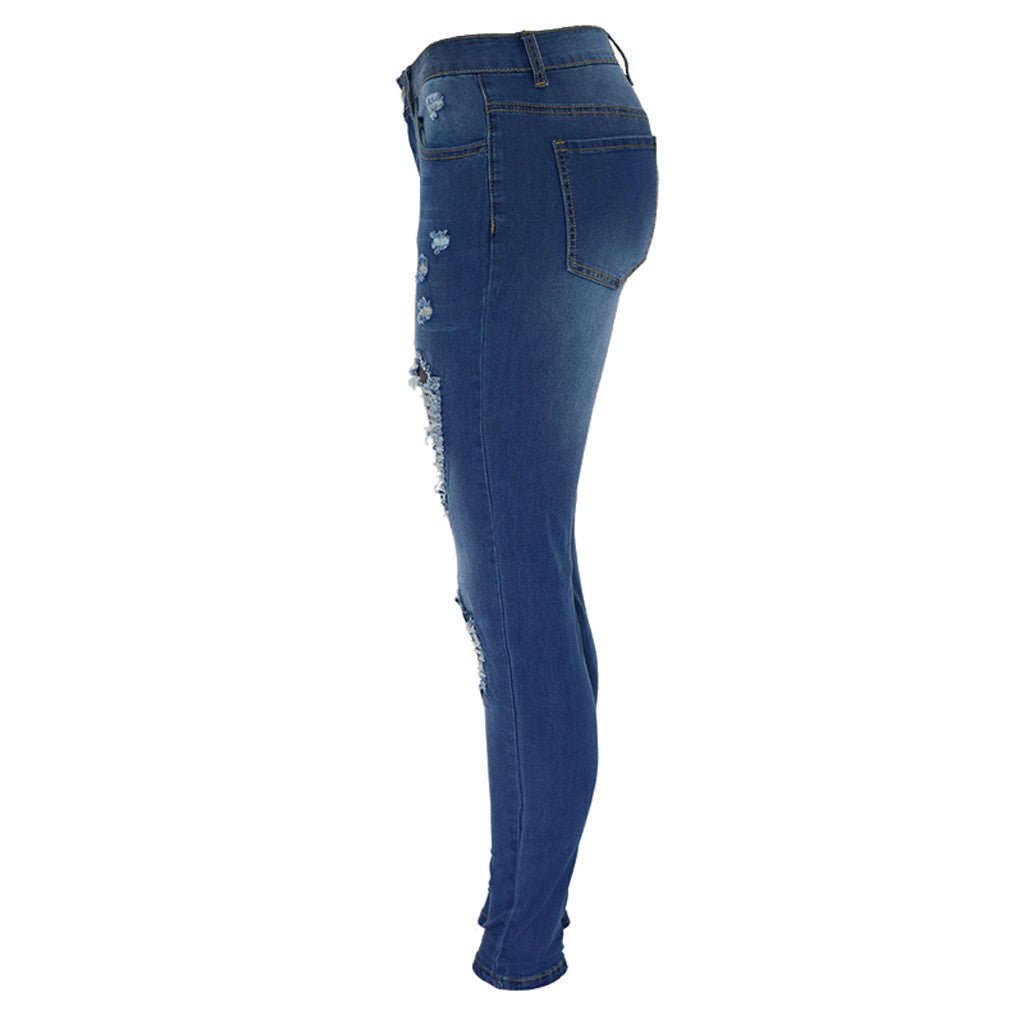 Blackthorn 31 ripped hip jeans showing distressed denim with frayed holes and casual fit on a model.