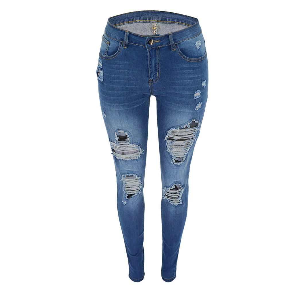 Blackthorn 31 ripped hip jeans with distressed detailing and frayed edges, showcasing a trendy casual denim style.