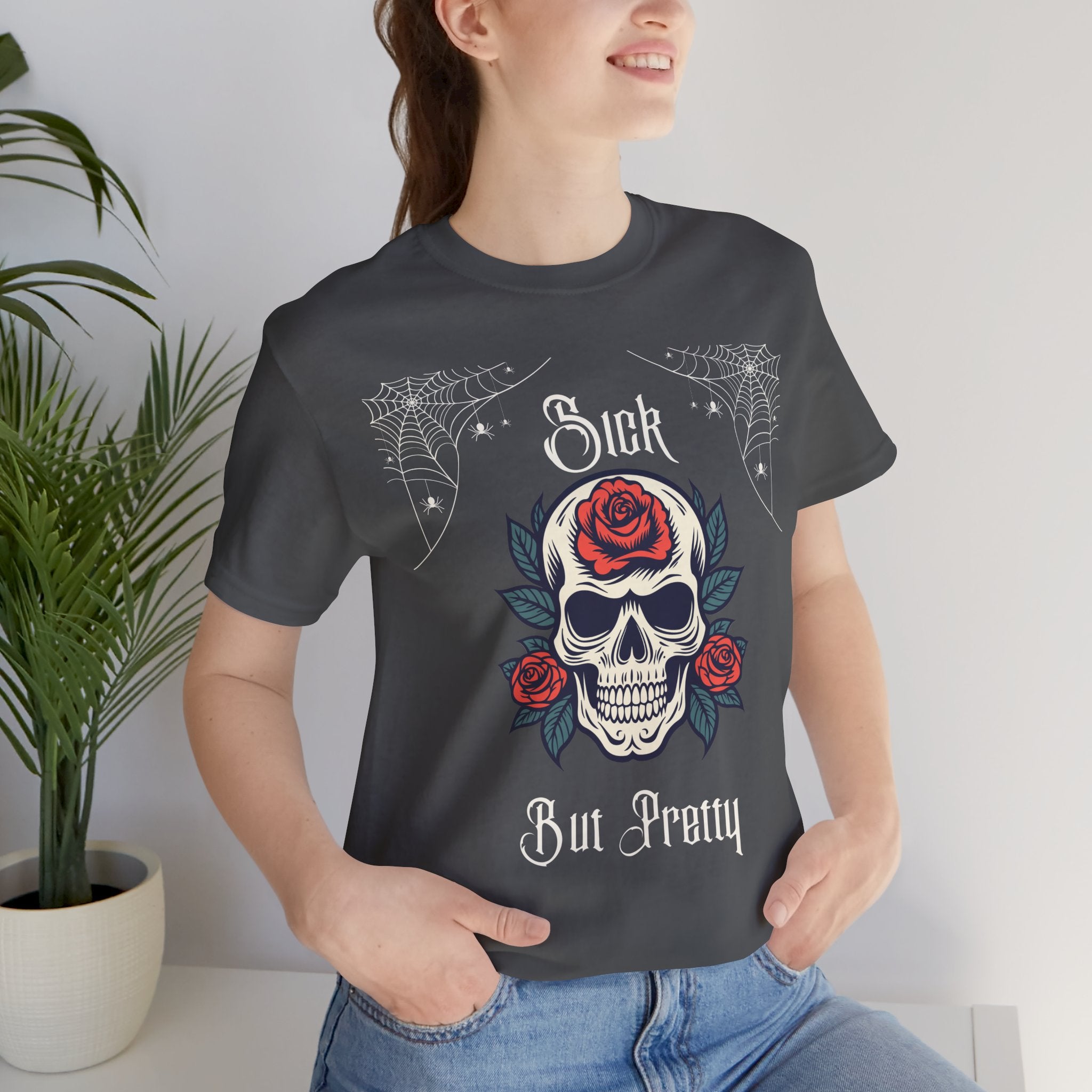 Black Skull and Spiderweb T-Shirt by Printify featuring a detailed skull graphic and web design on soft fabric.