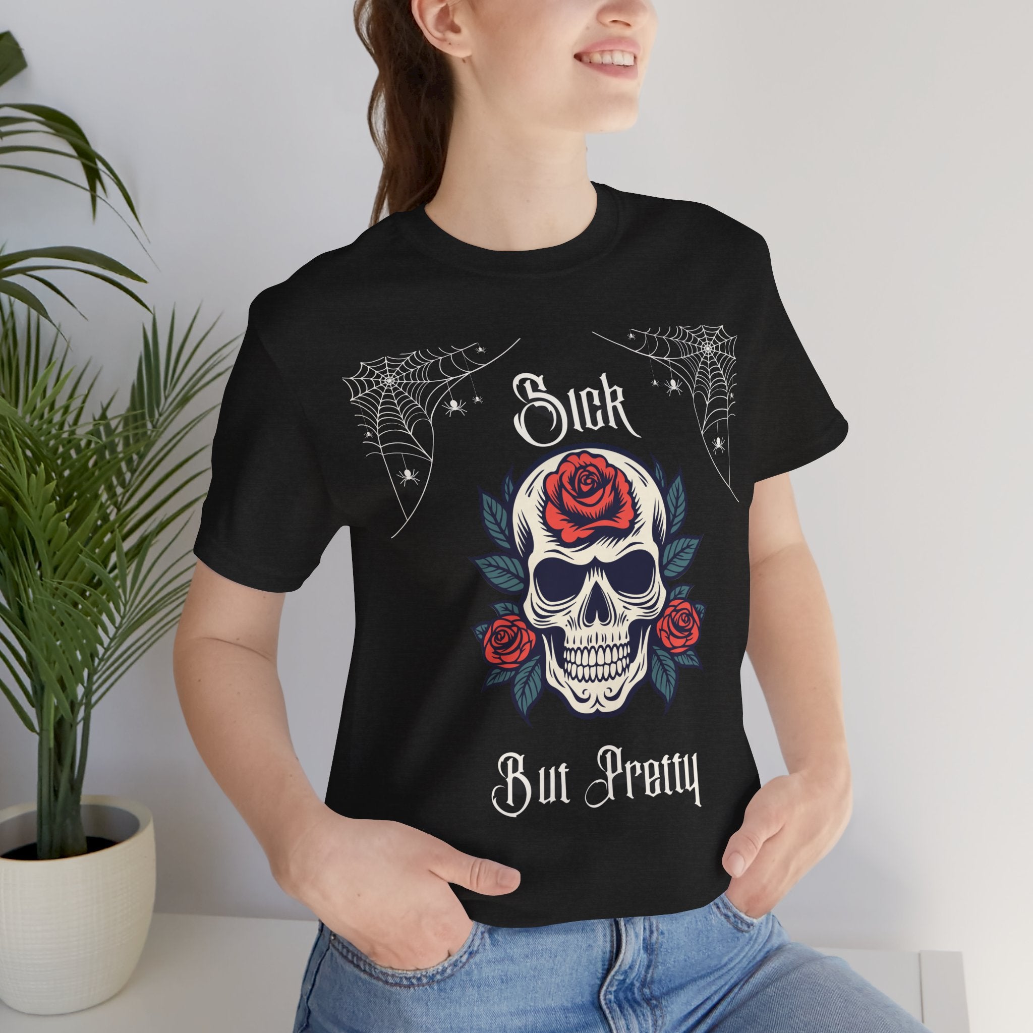 Black Skull and Spiderweb T-Shirt with "Sick but Pretty" graphic, casual unisex print by Printify on soft cotton fabric.