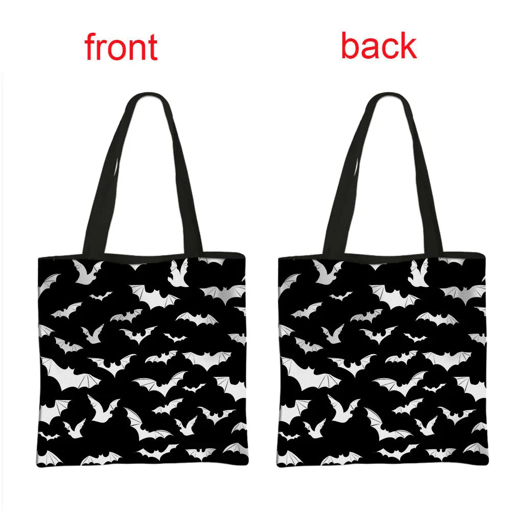 Black goth tote bag with bat design from Green Witch Creations, featuring a spacious accessory bag with gothic witchy style.