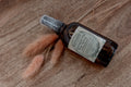 MoonFarma essential oil bug spray bottle with natural ingredients and spray nozzle for outdoor insect repellent.
