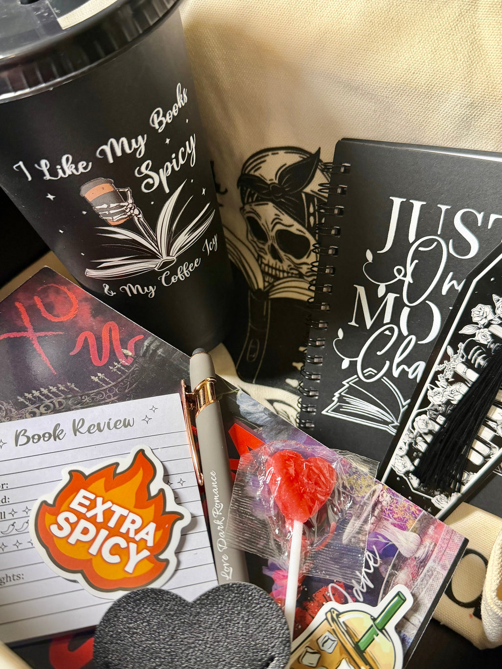 Dark Romance Crates Book Club kit featuring dark romance books and merchandise for book parties and reading gatherings.