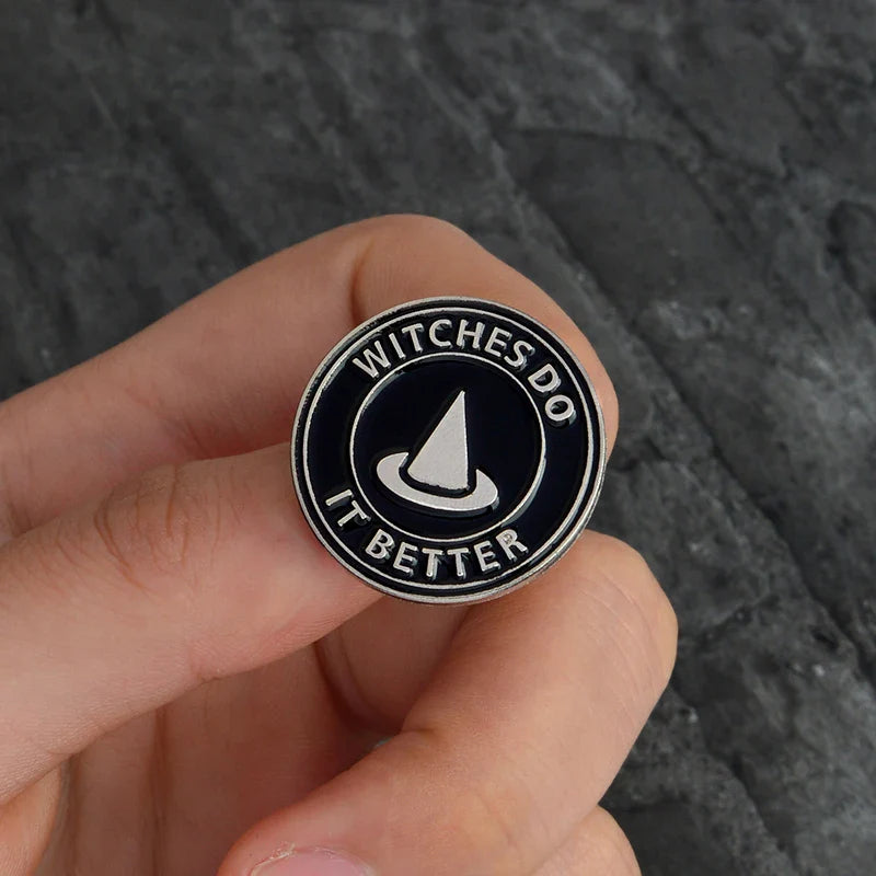 Black and white witchy pins by Green Witch Creations, featuring mystical designs suitable for accessorizing clothing or bags.