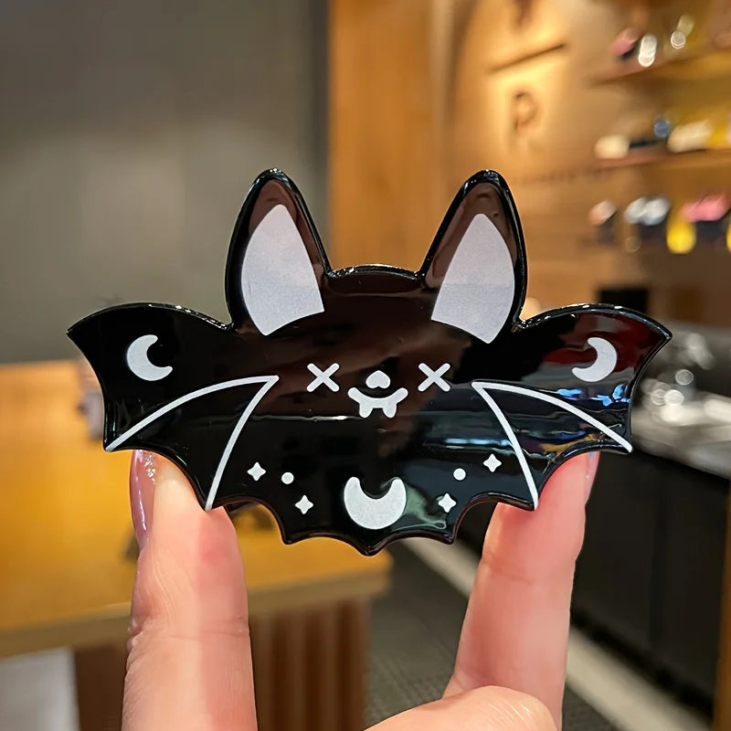 Halloween bat hair claws by Green Witch Creations, spooky black hair accessories with bat-shaped decorations for festive styling.