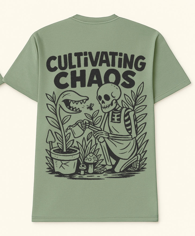 Looming Mischief Cultivating Chaos T-Shirt featuring a bold graphic design on a casual black clothing top.