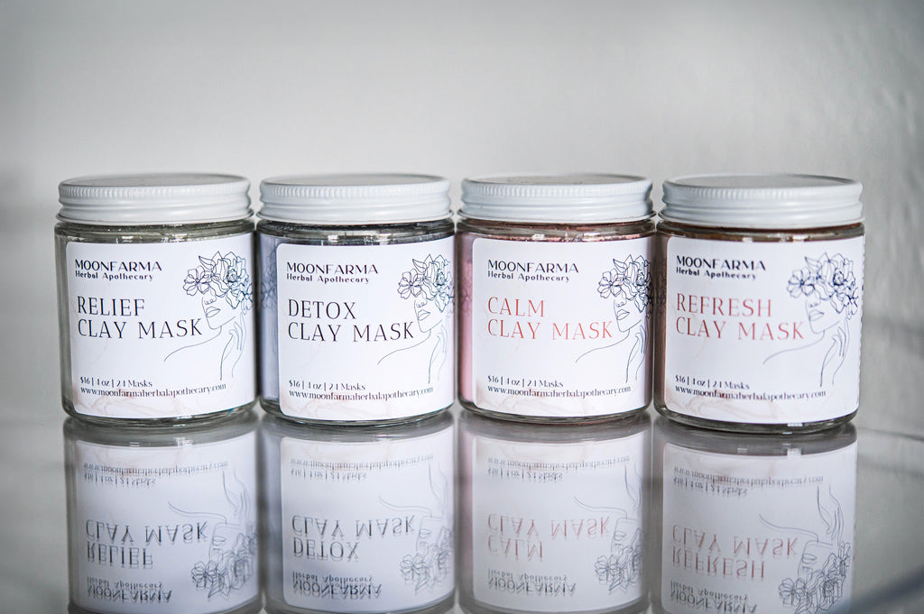 Creamy clay face mask by MoonFarma, showing a jar of the skincare product with a smooth, clay-textured surface.