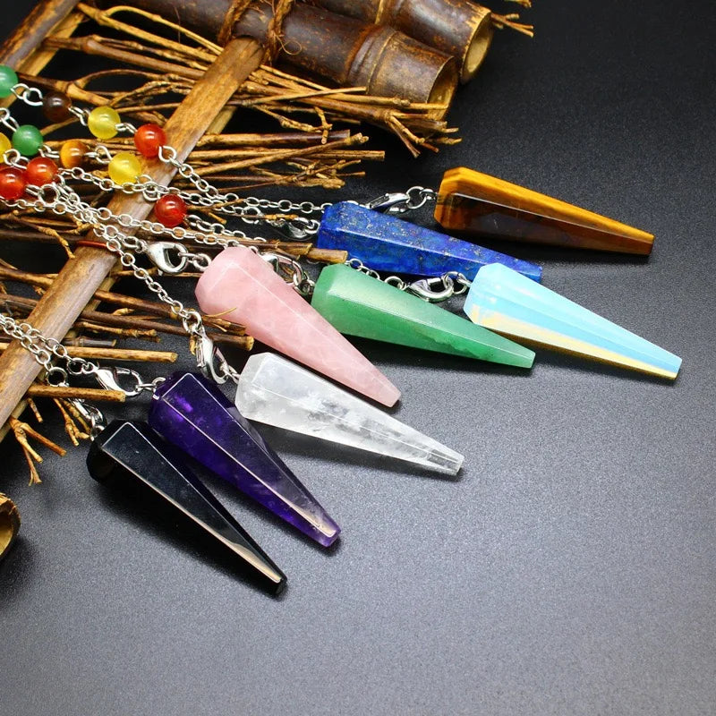 Green Witch Creations triple moon pentacle chakra pendulum with intricate design, used for spiritual healing and divination.
