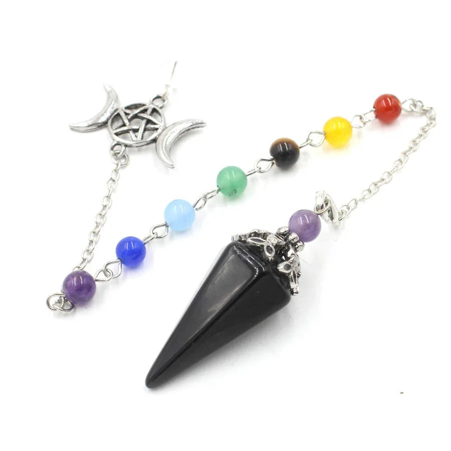 Triple Moon Pentacle Chakra Pendulum by Green Witch Creations featuring a silver pendant with moon and pentacle symbols on a chain.