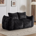 Blackthorn 31 oversized black bean bag couch for adults, soft plush loveseat with pillows, perfect for living room or bedroom lounging.