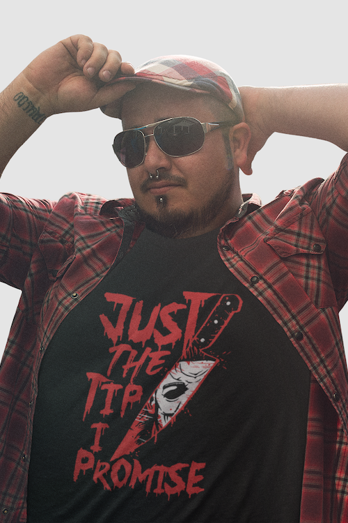 Blackthorn 31 Just the Tip Horror T-shirt featuring a round neck and a graphic print of a cool guy with a hat.