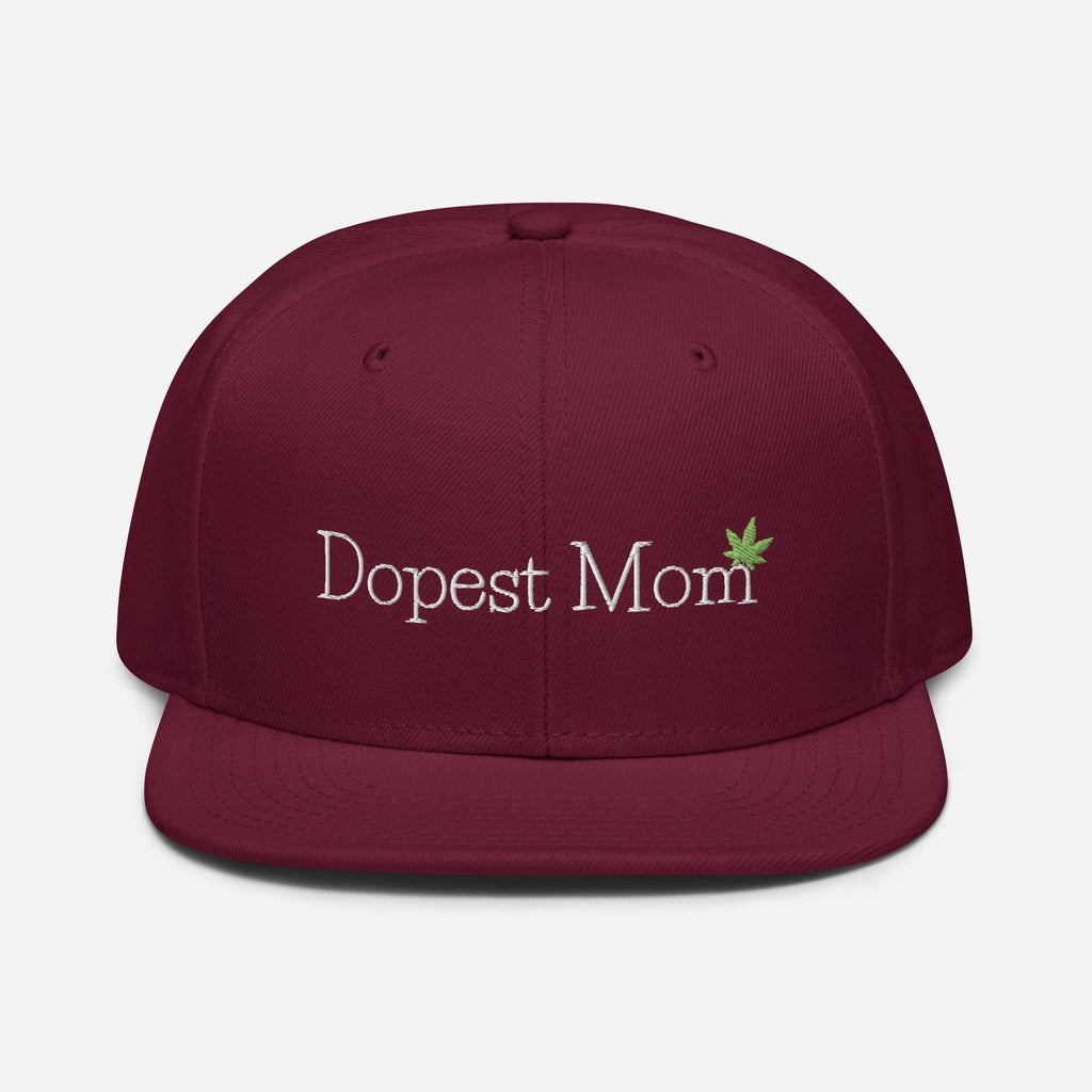 Maroon Burgundy Dopest Mom Cannabis Snapback Hat by The Cannabis Community with adjustable strap and embroidered logo on front.