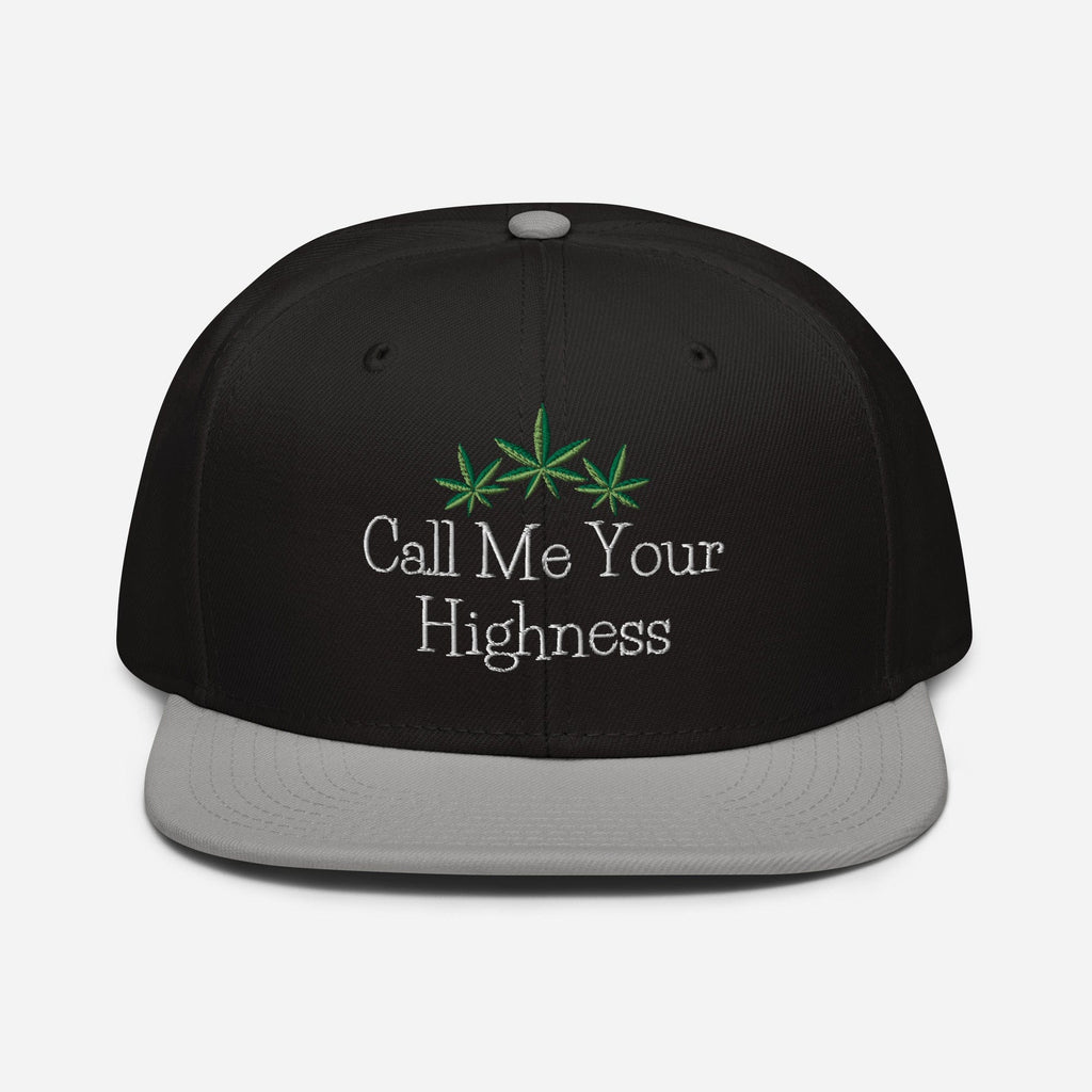 Gray and black Call Me Your Highness snapback hat by The Cannabis Community with front embroidery detail.