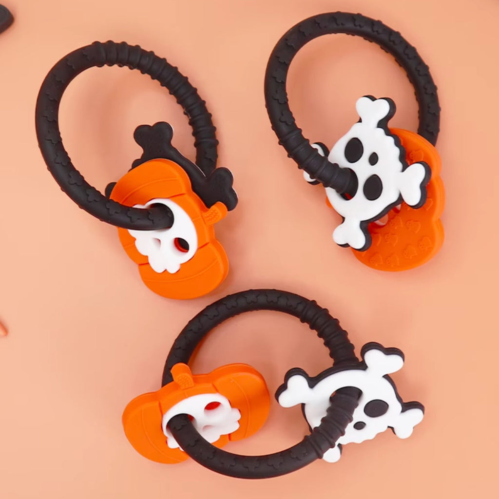 Witching Hour Baby Spooky Fun Ring Teether for babies, featuring a colorful Halloween-themed design and soft, chewable material.