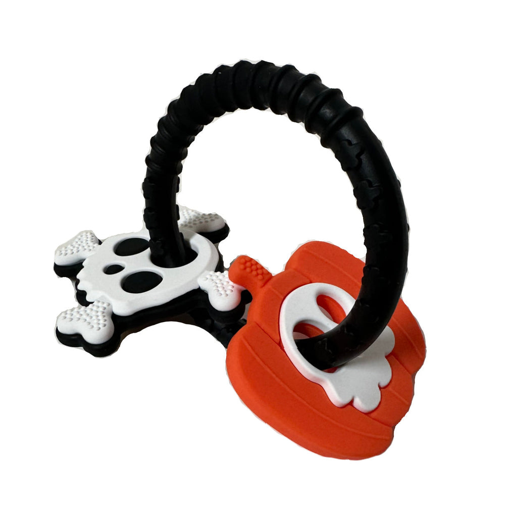 White Spooky Fun Ring Teether by Witching Hour Baby, a colorful silicone baby teething ring with spooky-themed design.