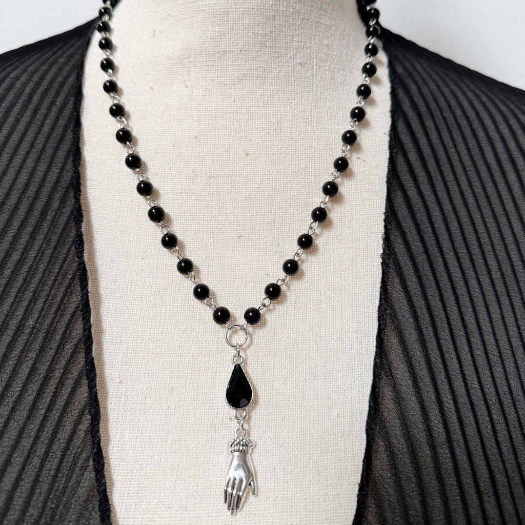 Witching Hour Baby Tears of Sorrow necklace featuring a delicate pendant with intricate design in jewelry style.