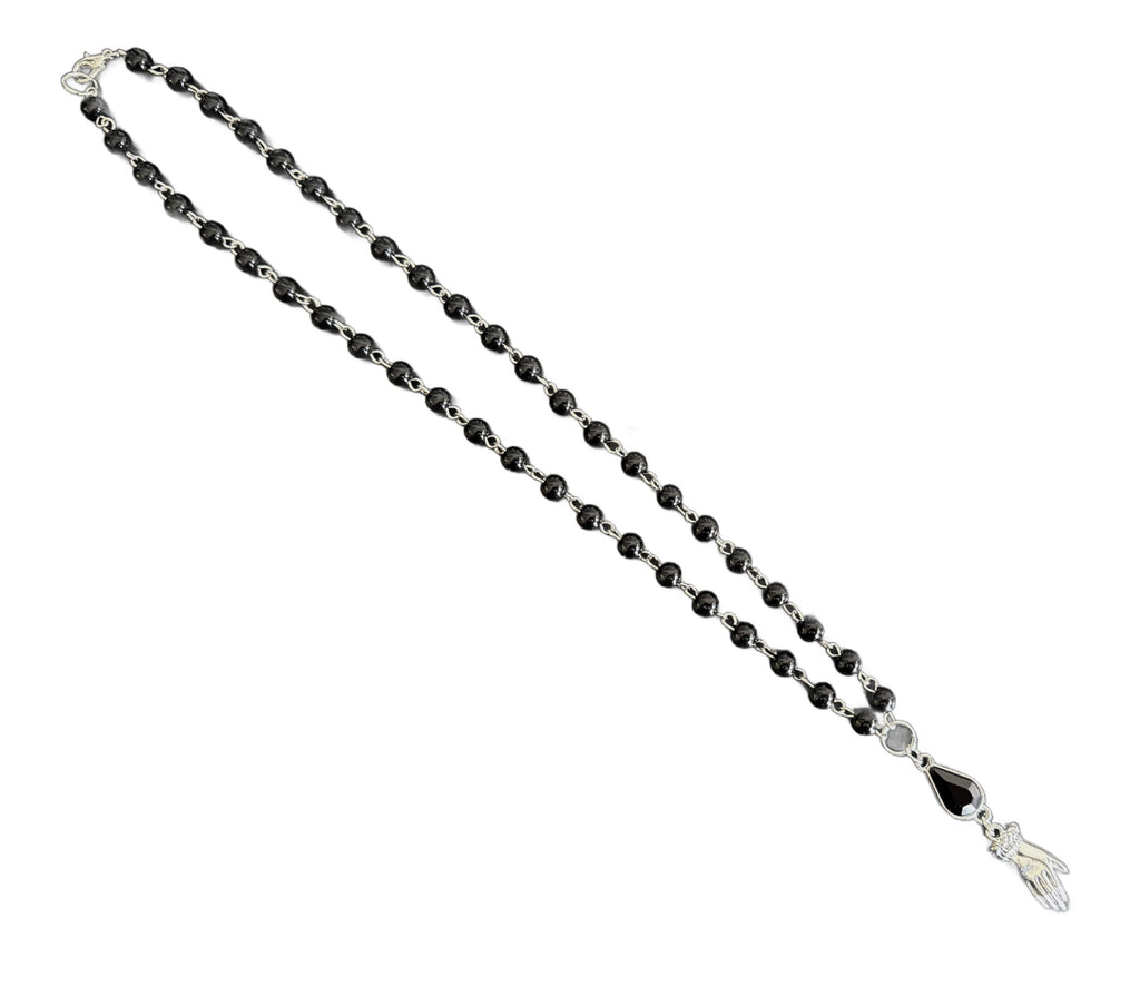 Silver Tears of Sorrow Necklace by Witching Hour Baby featuring a delicate teardrop pendant on a chain.